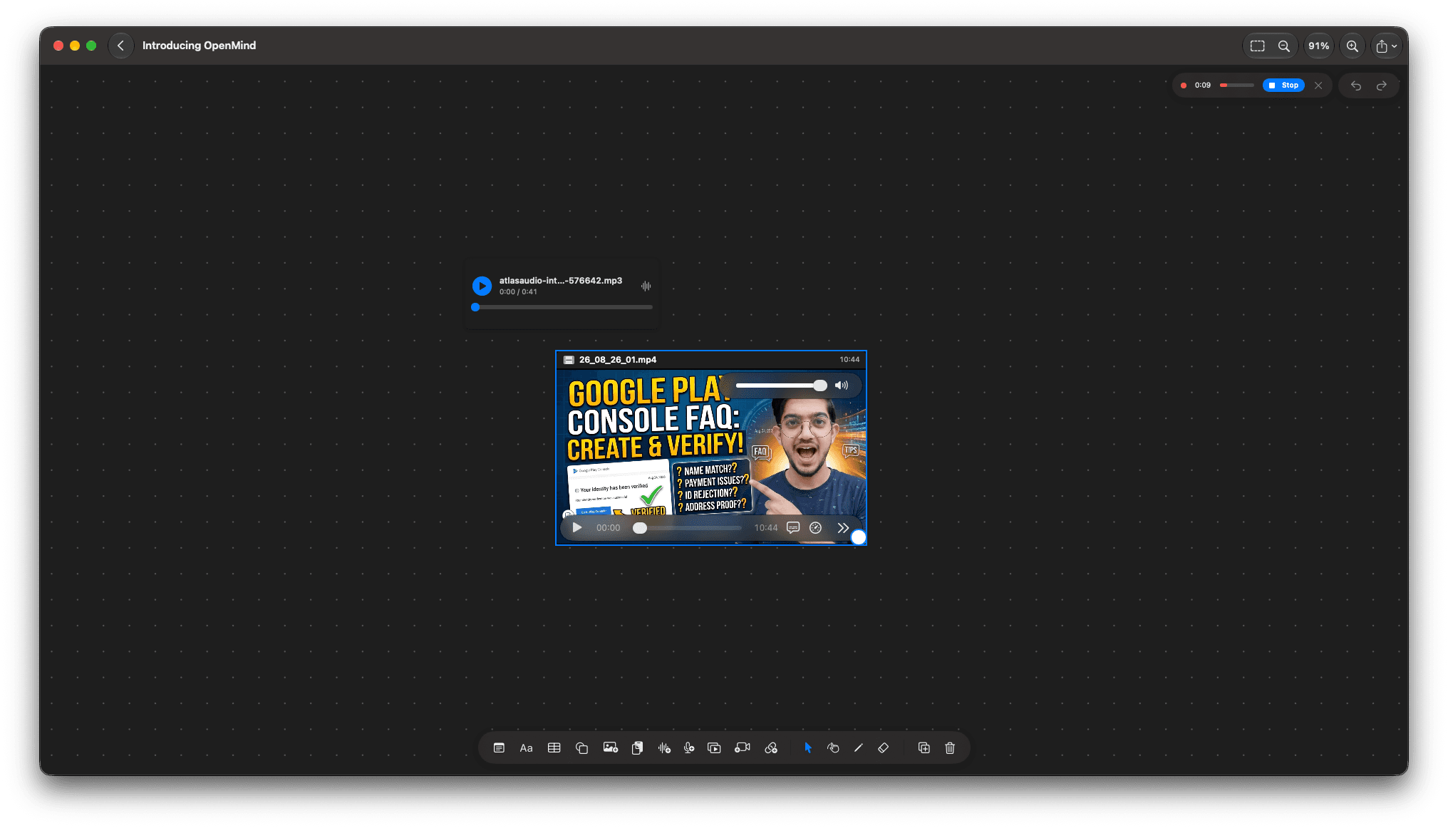 OpenMind canvas with an audio player card and a video player card placed on the dotted grid, with a voice recording indicator in the toolbar area.